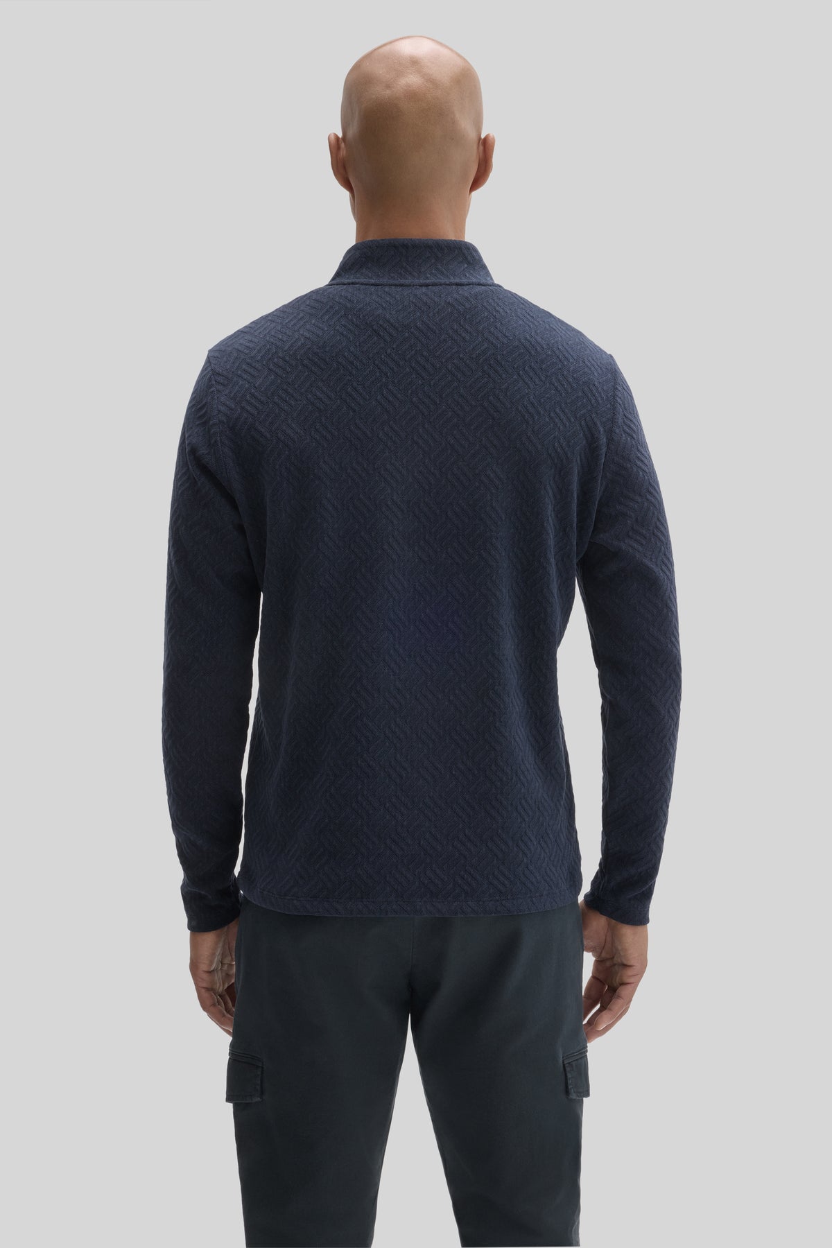 Dark navy textured long sleeve pullover with quarter zip collar, shown from back.