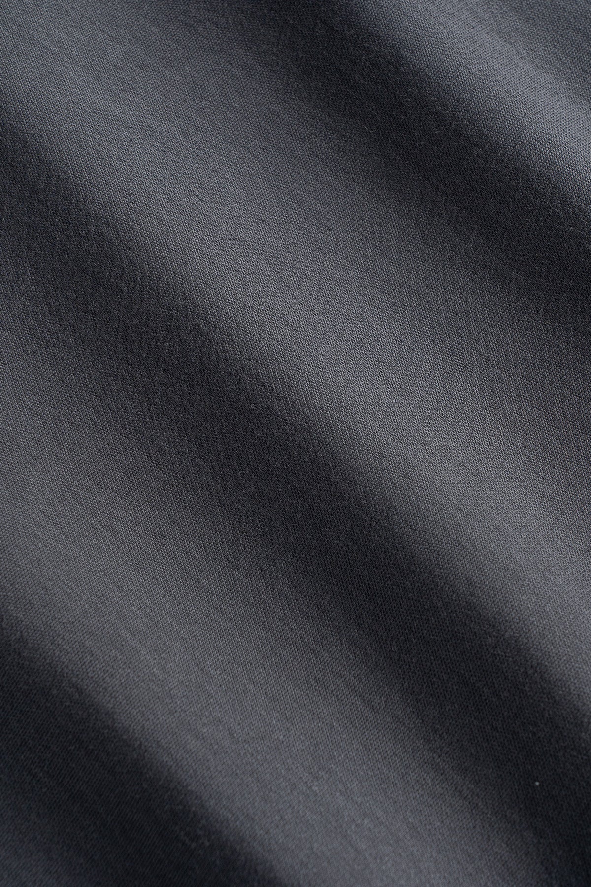 Charcoal gray crew neck sock in textured knit fabric with visible diagonal weave pattern.
