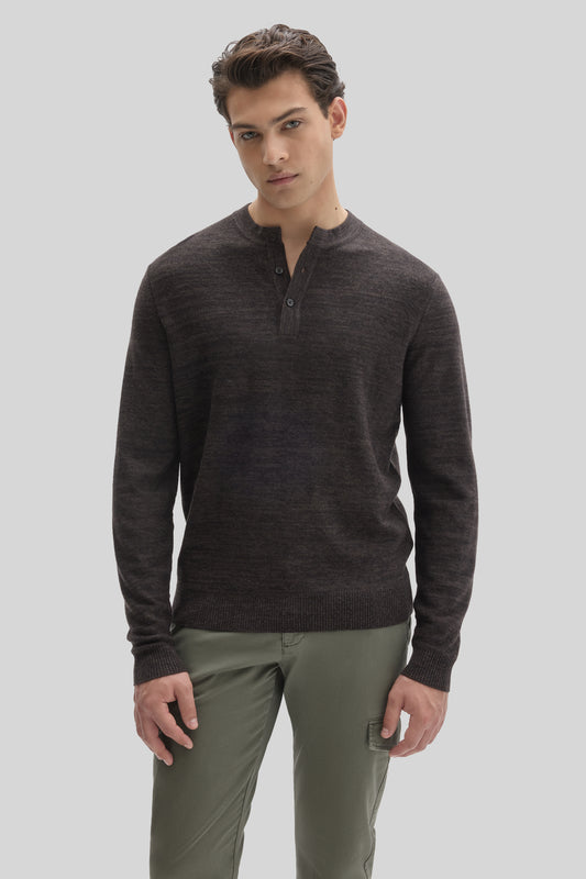 Charcoal gray henley sweater with button placket worn with olive cargo pants.